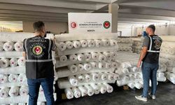 Mersin`de 9 milyon 300 bin lira değerinde kaçak polyester kumaş ele geçirildi