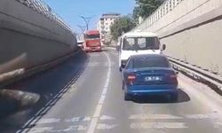 Trafikte şaşırtan anlar: Arızalanan otomobili geri geri çekti