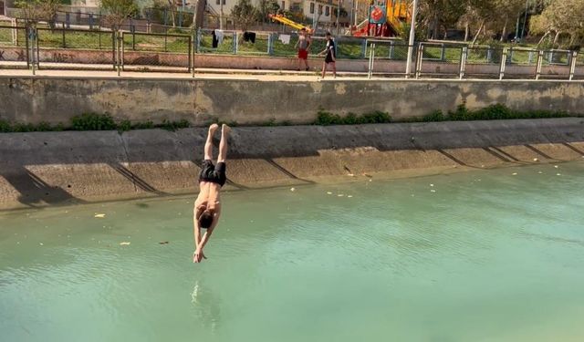 Mersin'de Tehlikeli Serinlik: Sulama Kanalında Yüzme Sezonu Açıldı